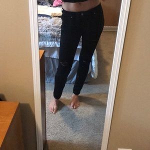PAIGE distressed black stretchy skinny pants